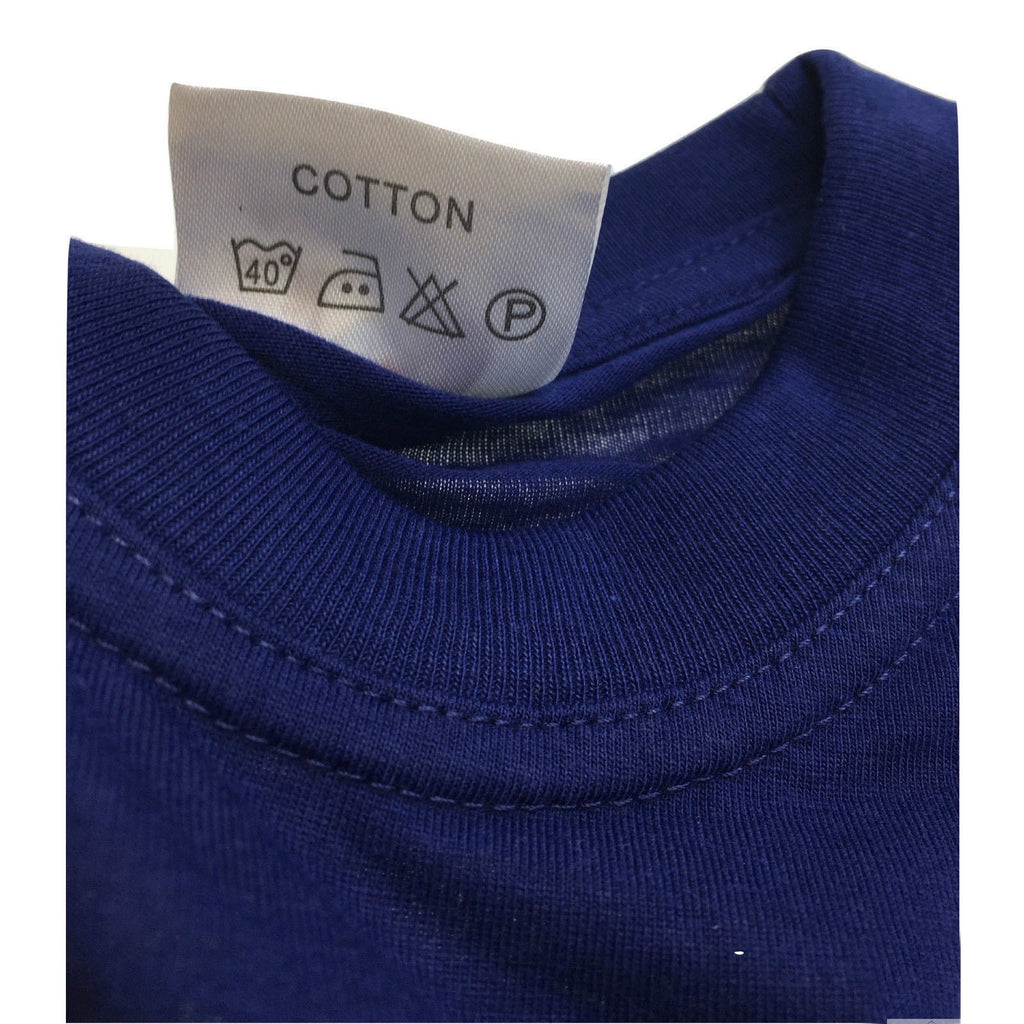 Close-up of a blue garment with a cotton label on a white background