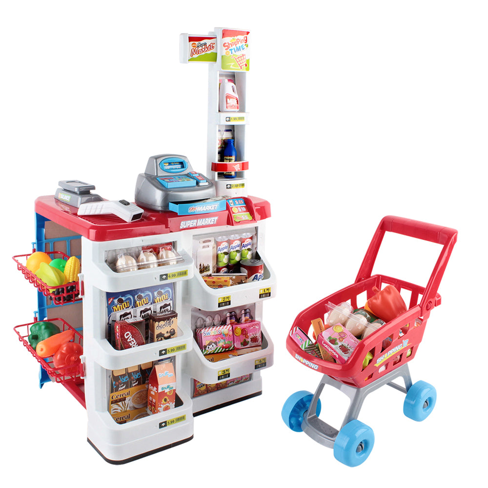 Toy supermarket set with a cash register, shelves, and a shopping cart on a white background