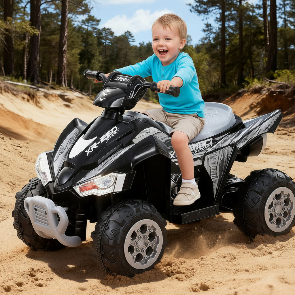 Black and gray ATV on a sandy terrain with trees in the background