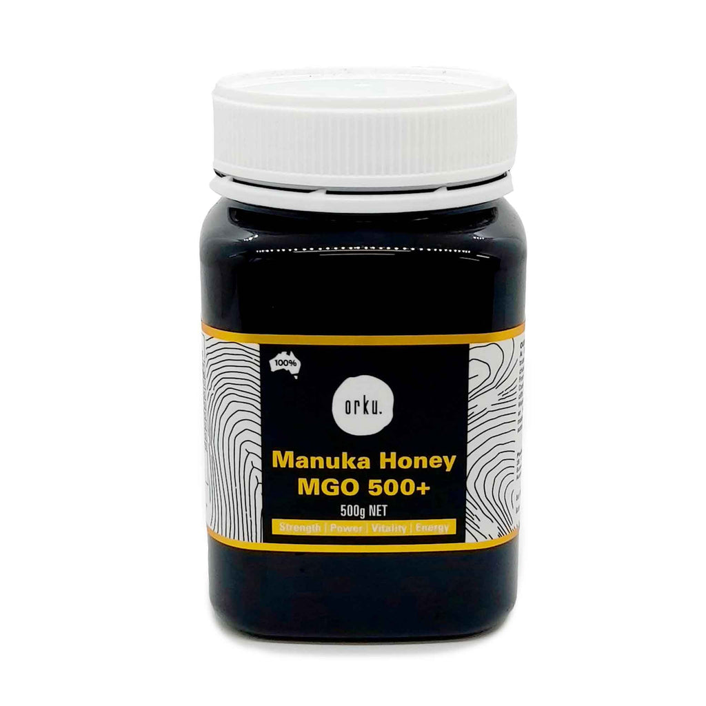 Jar of Manuka Honey MGO 500+ with a white lid on a white background