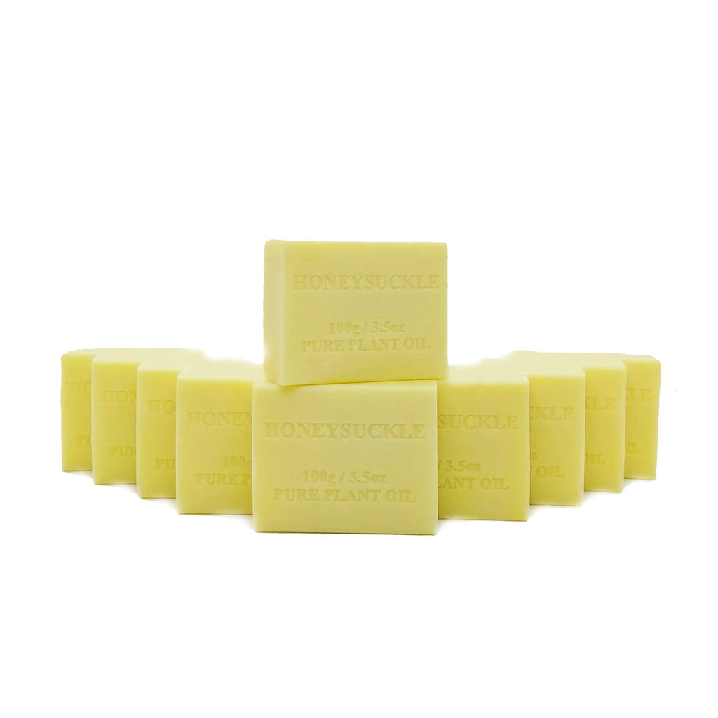Yellow soap bars with 'Honeysuckle' branding on a white background