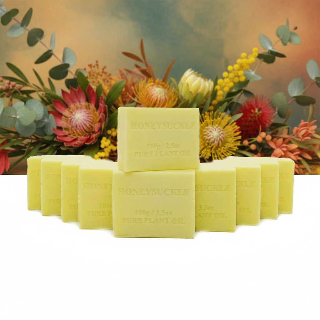 Yellow soap bars with 'Honeysuckle' branding on a white background