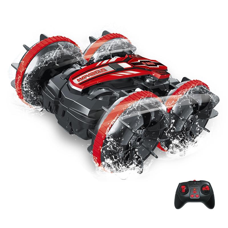 Robotic snow blower with red and black design on a white background