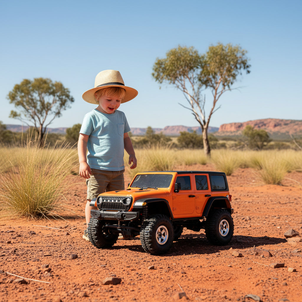 Orange off-road vehicle with large tires on a white background