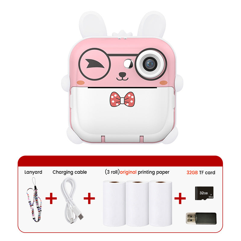 Pink and white instant camera with bunny ears and accessories on a white background